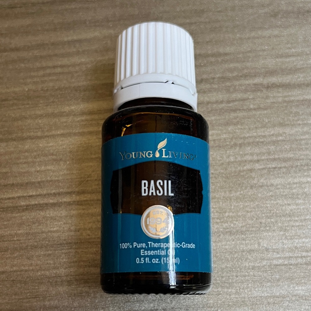 Young Living Basil Essential Oil in Amber and White